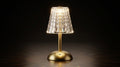 The Notting Hill cordless crystal touch lamp glowing warm white on a dark background